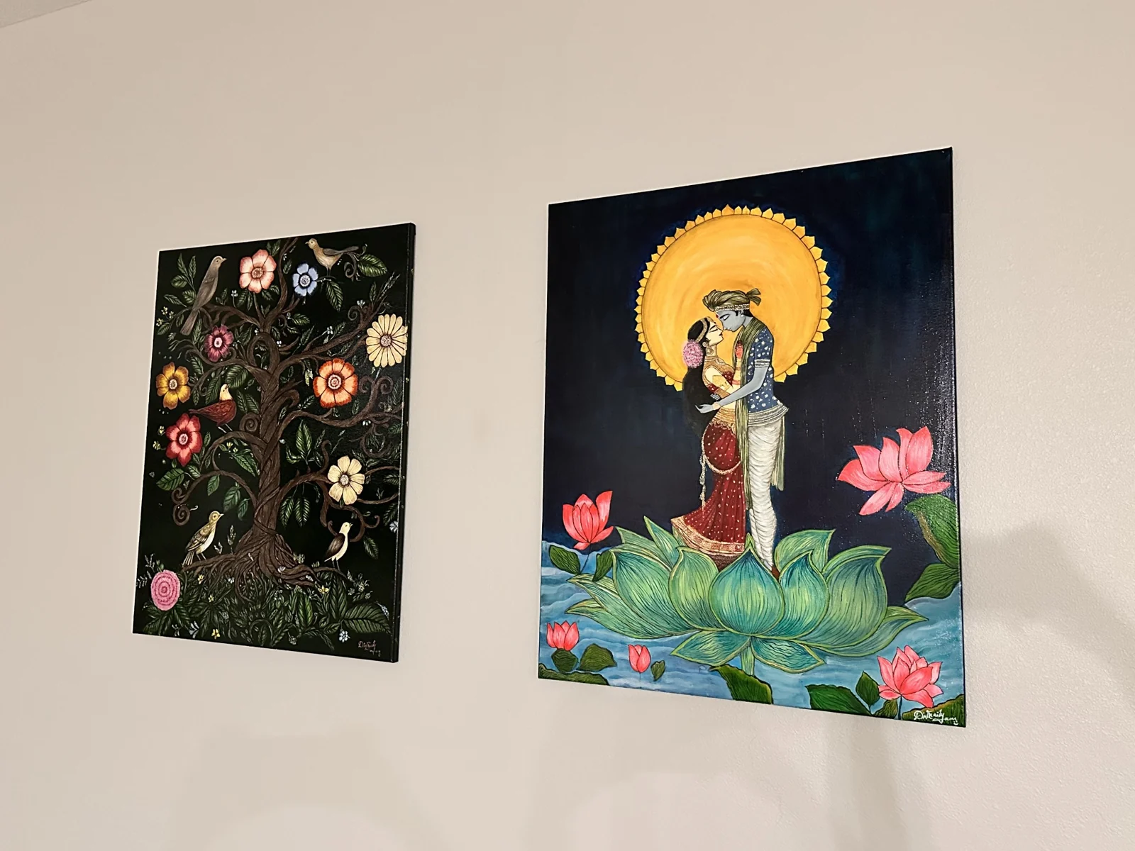 Two original paintings displayed together